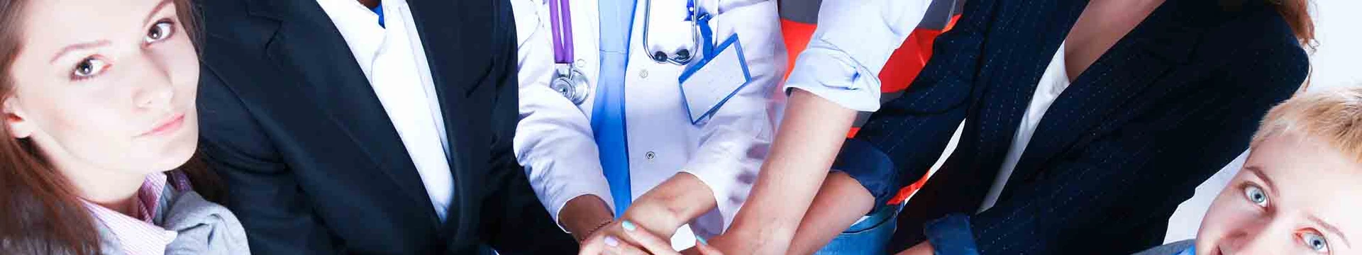 Coworkers standing together in a circle