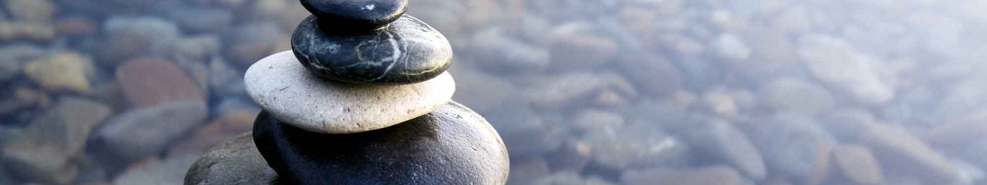 Zen rocks stack in shallow water